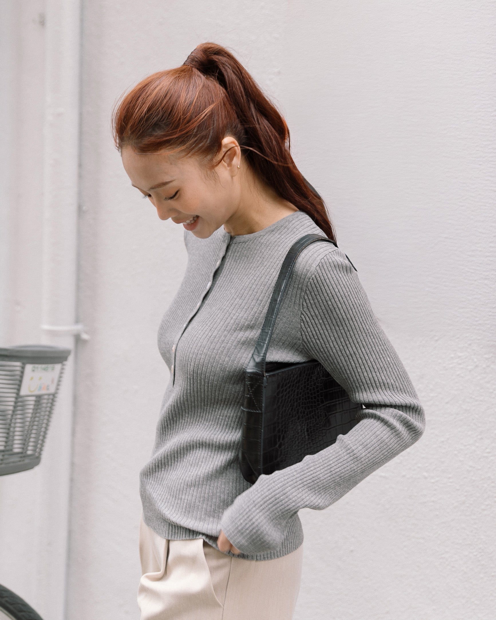 ' sts ' 坑條圓領針織長袖上衣