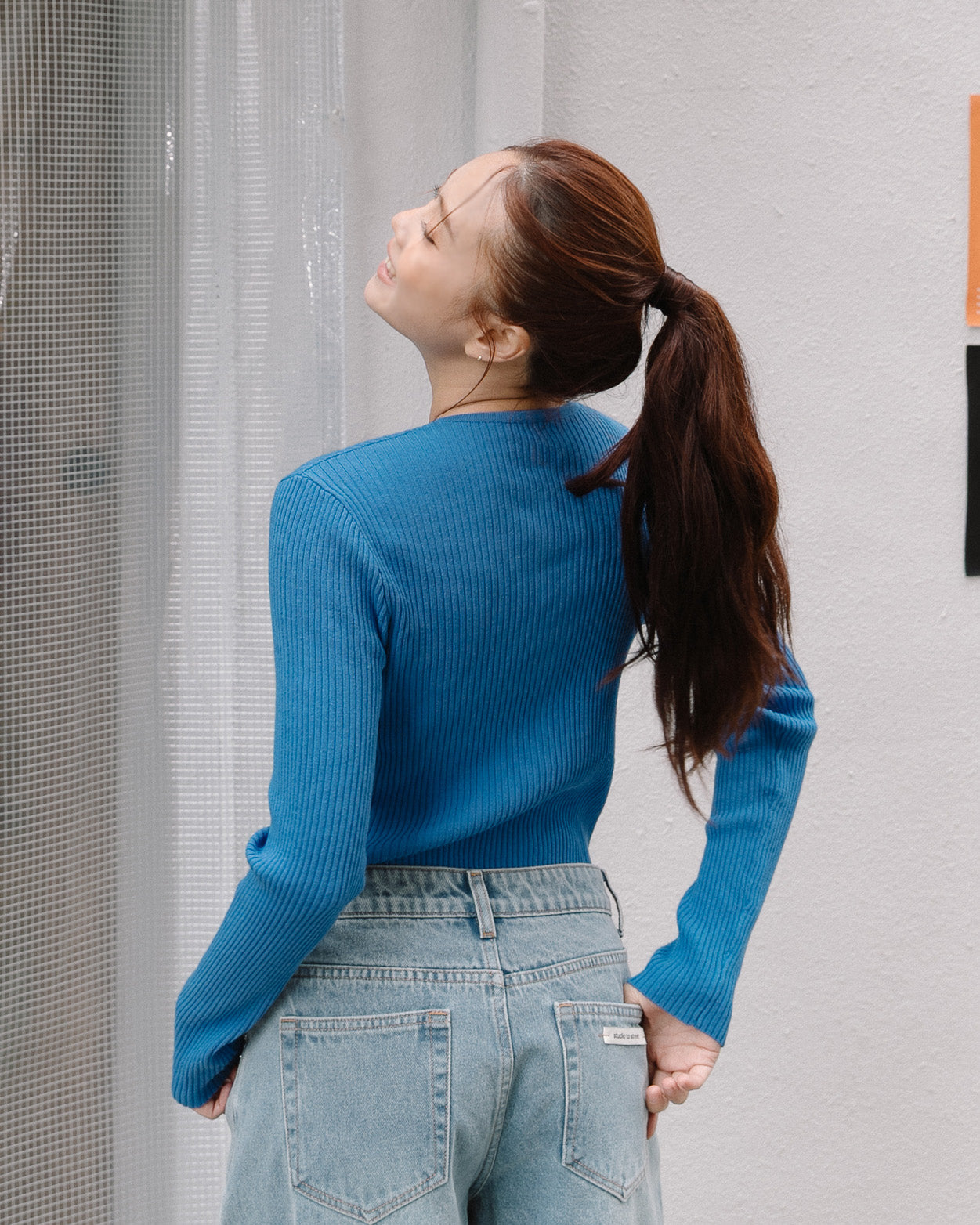 ' sts ' 坑條圓領針織長袖上衣