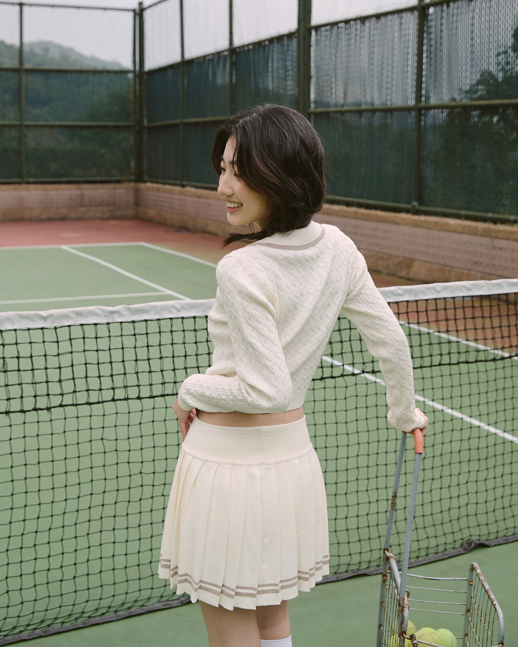 ' sts '  撞色針織長袖上衣